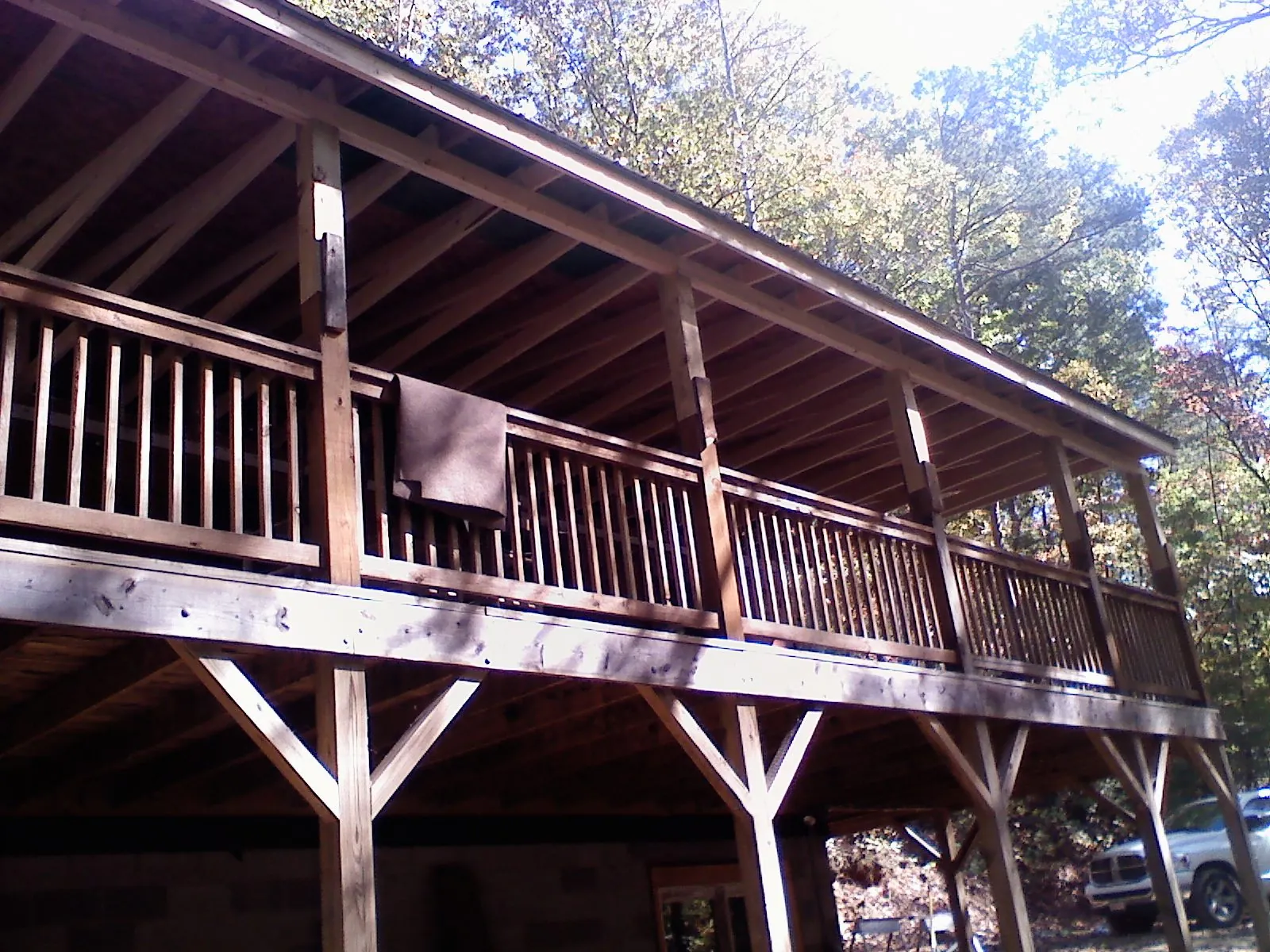 Timber framing under a new elevated porch and deck — Roof Leak Repair in Nacogdoches by Roofing Brothers